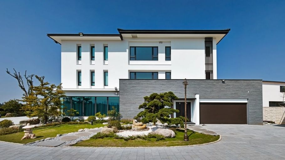 Biệt thự 200m2 có gara, có mặt tiền trắng – mái đen phẳng