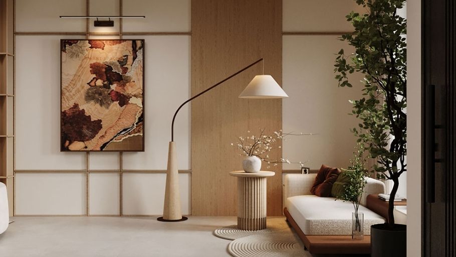 Góc chuyển tiếp với đèn sàn cong, daybed vải kem, bàn phụ tròn, cây xanh và rèm lụa
