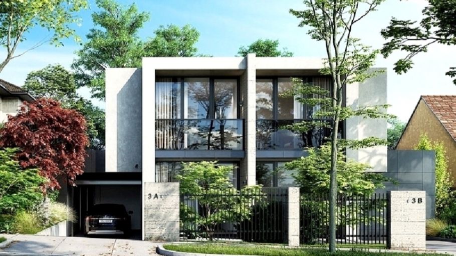 Mẫu biệt thự đơn lập 2 tầng hiện đại với thiết kế hình khối mạnh mẽ, kết hợp hài hòa giữa vật liệu kính và cây xanh tạo không gian sống mở