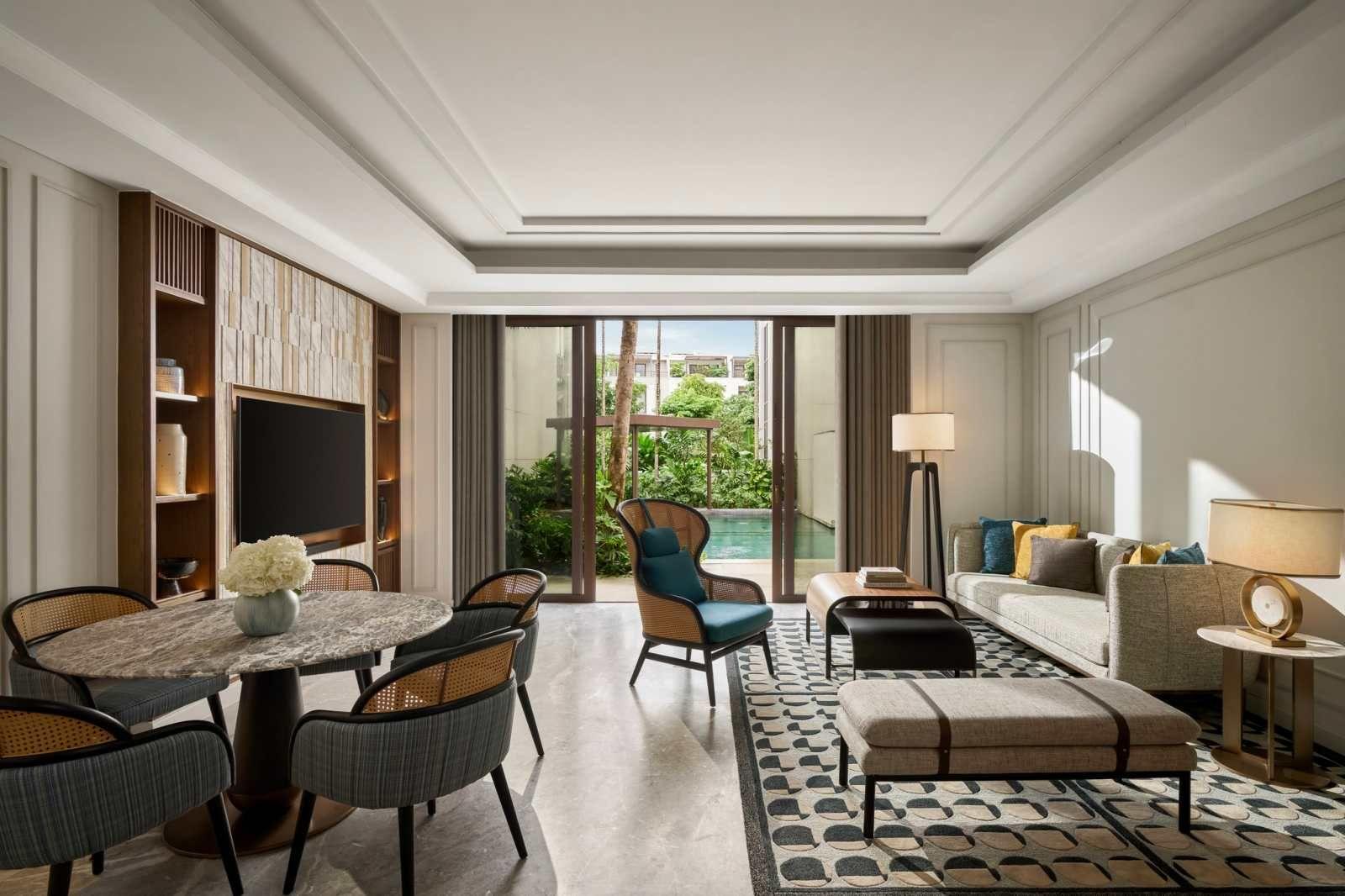 The living area in the villa with a refined design, emphasizing the resort experience