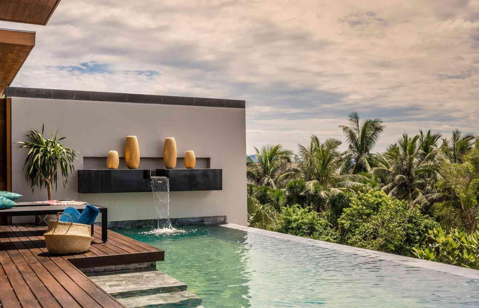 The Anantara beach villa architecture harmoniously combining modern amenities and a stunning ocean landscape