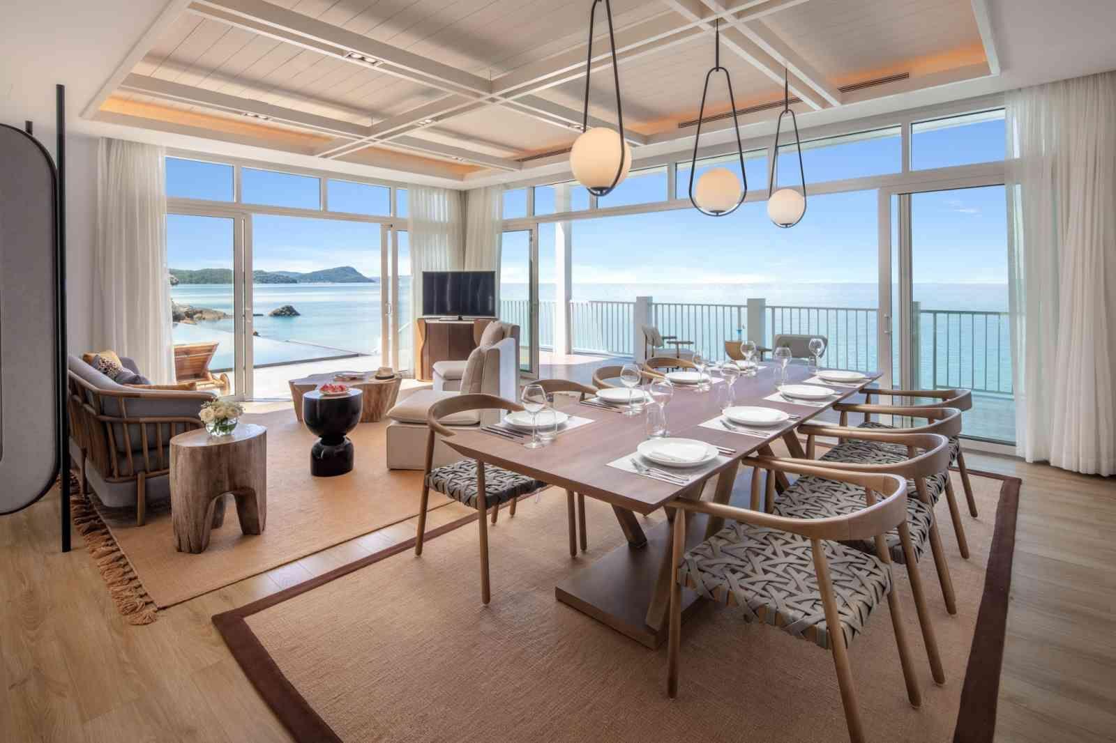 A high-end beach villa interior using refined lines, delivering a comfortable and classy resort experience