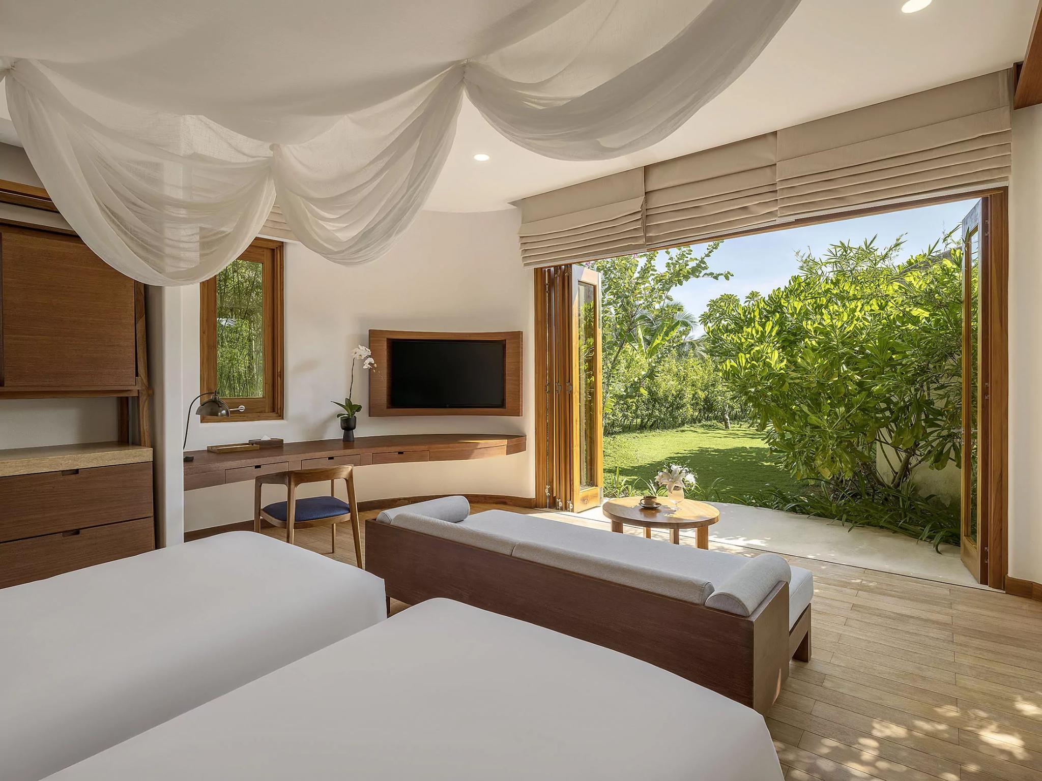 A Minimalism beach villa bedroom uses a gentle palette, creating an elegant and relaxing resting space