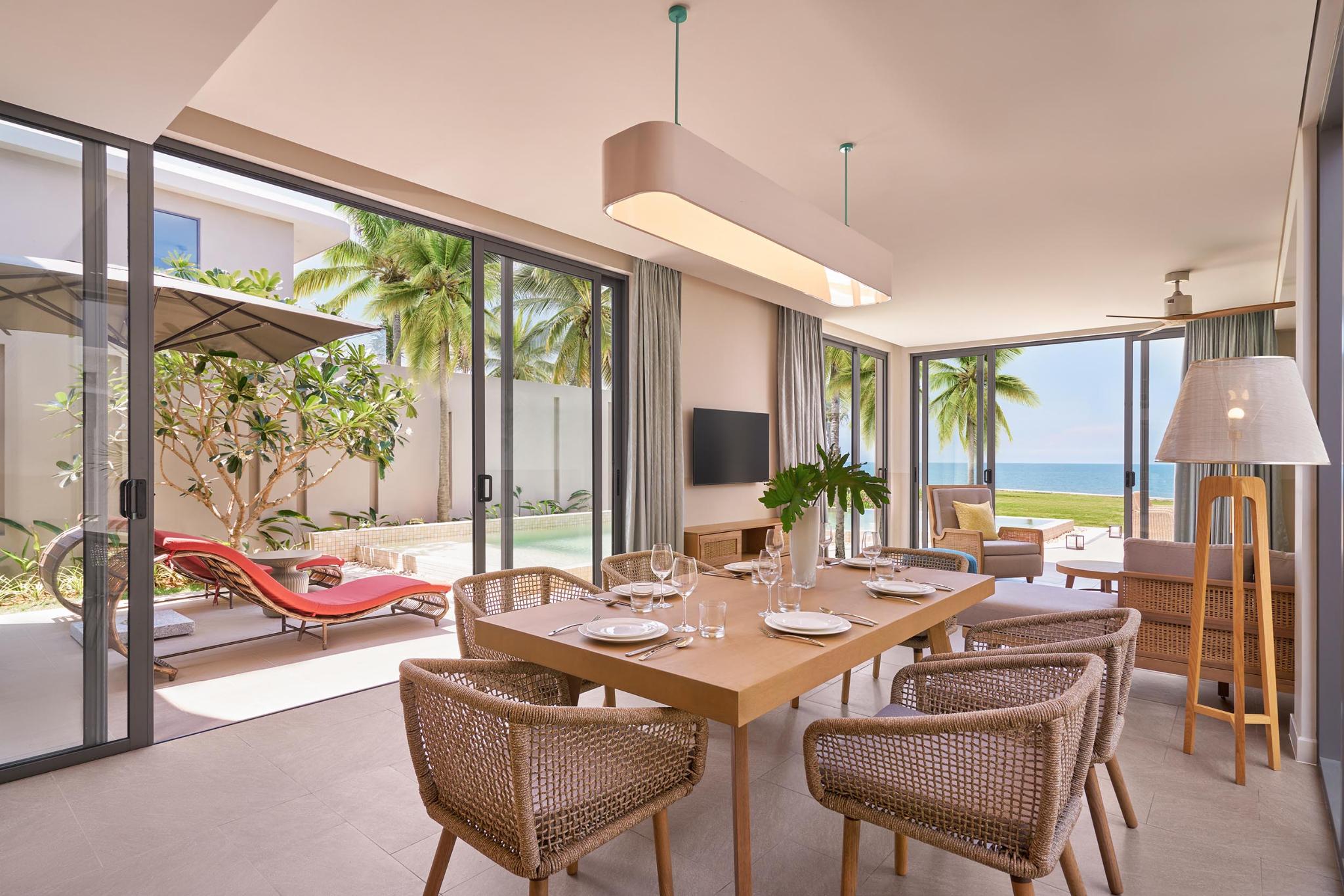 A beachfront resort villa design with a luxurious, timeless European style