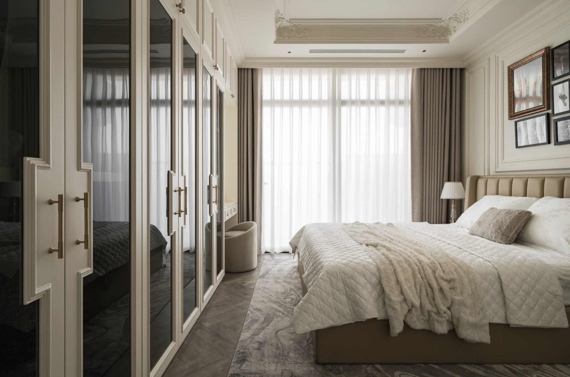 A spacious bedroom using a neutral palette, bringing a fully relaxing and restful feel.