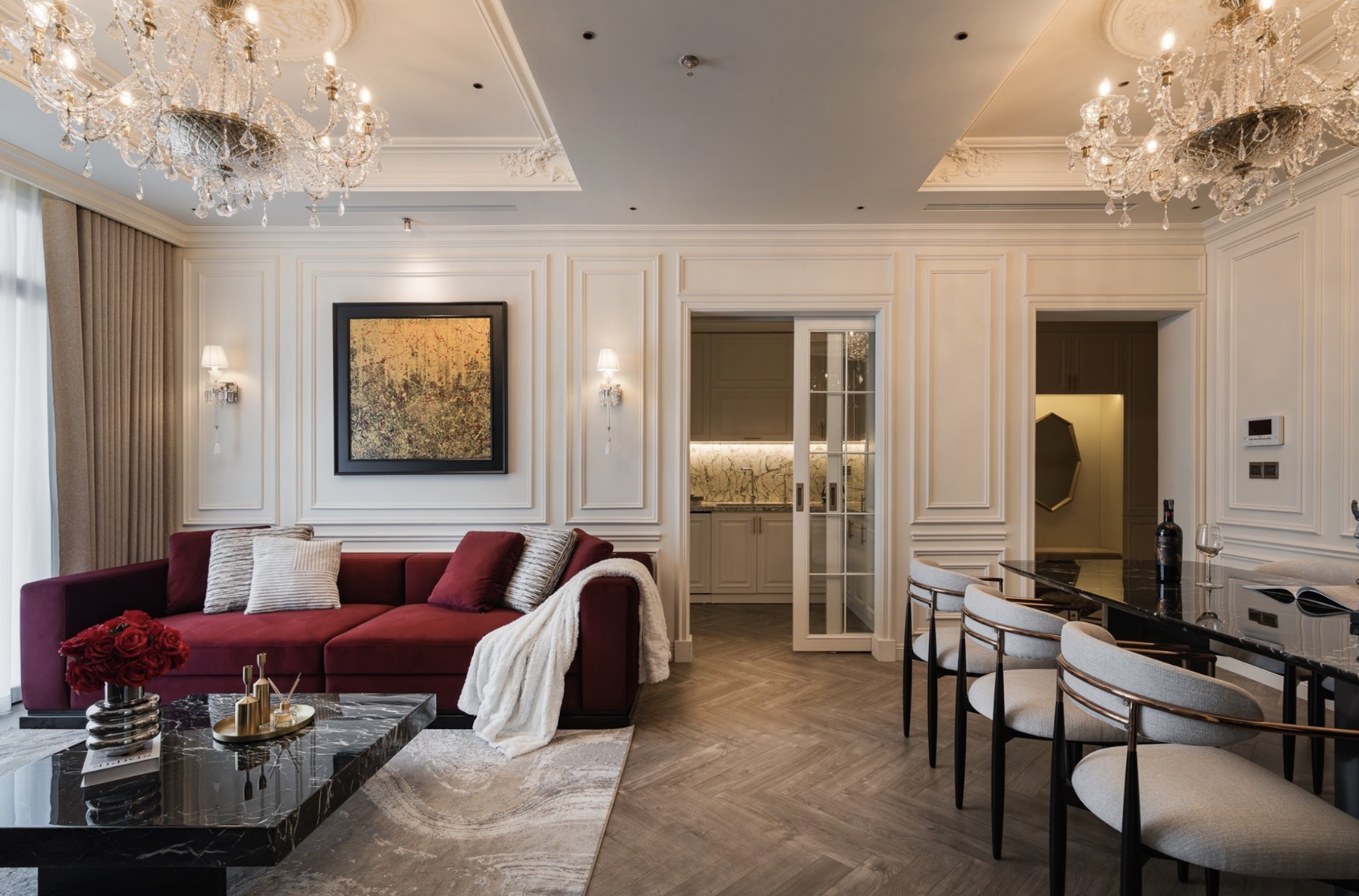 A modern minimalist living room, combining natural light and refined premium materials.