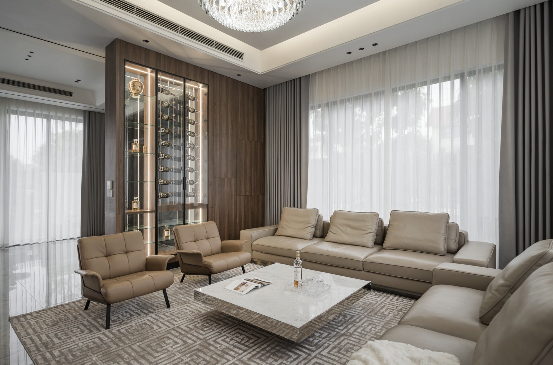 The Hung Thai District 7 villa living room has an open design, connecting the garden and maximizing natural light.