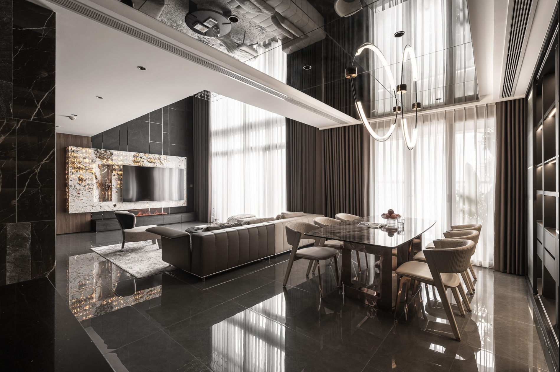 The My Kim villa living room uses premium materials to create a luxurious, balanced space.
