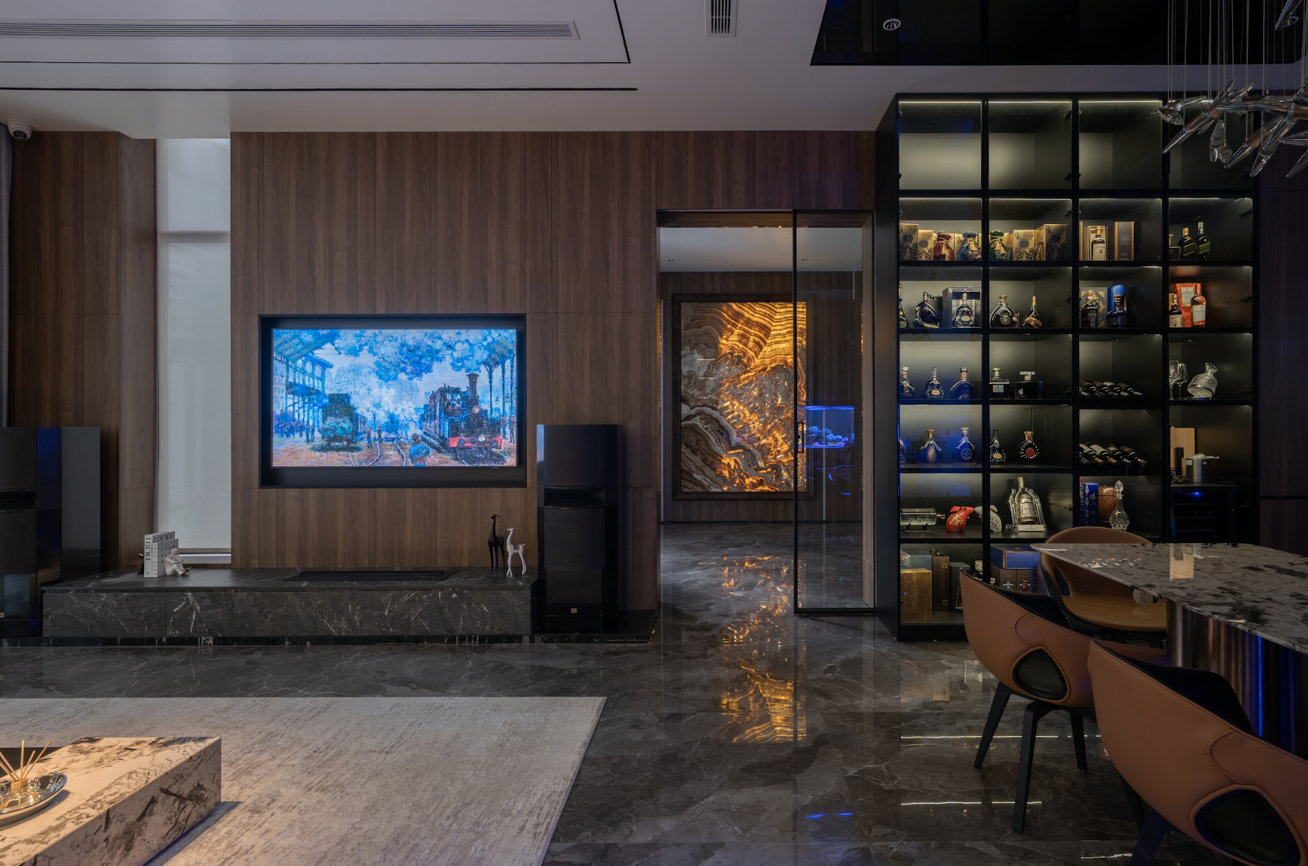The Modern Luxury living room uses marble, natural wood, and light to create a luxurious beauty.
